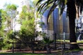 Large steel wine vats among palm trees at Seppeltsfield